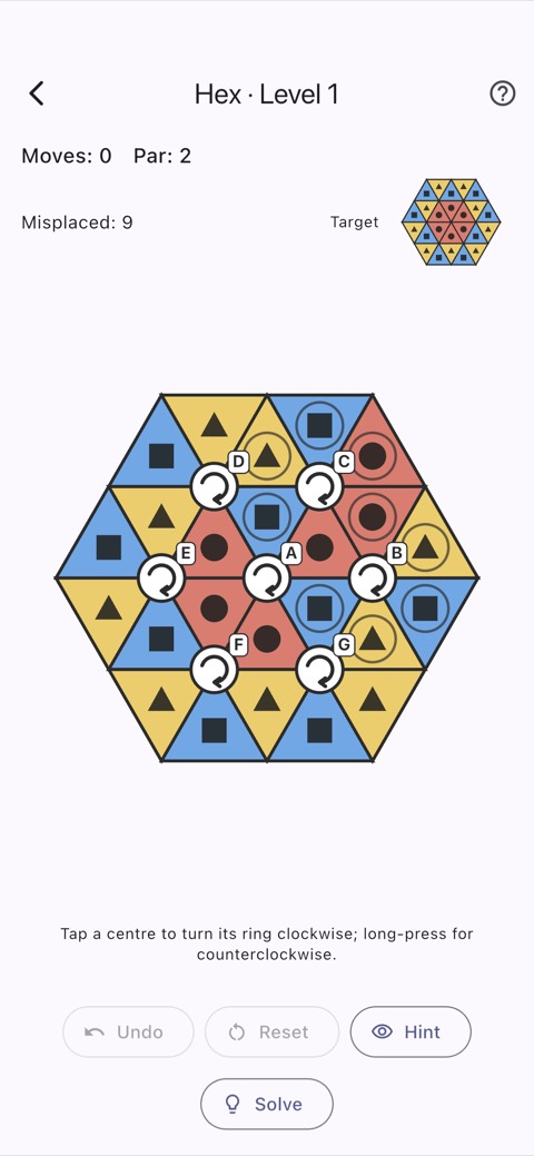 A Vertex Twist board of coloured triangles.